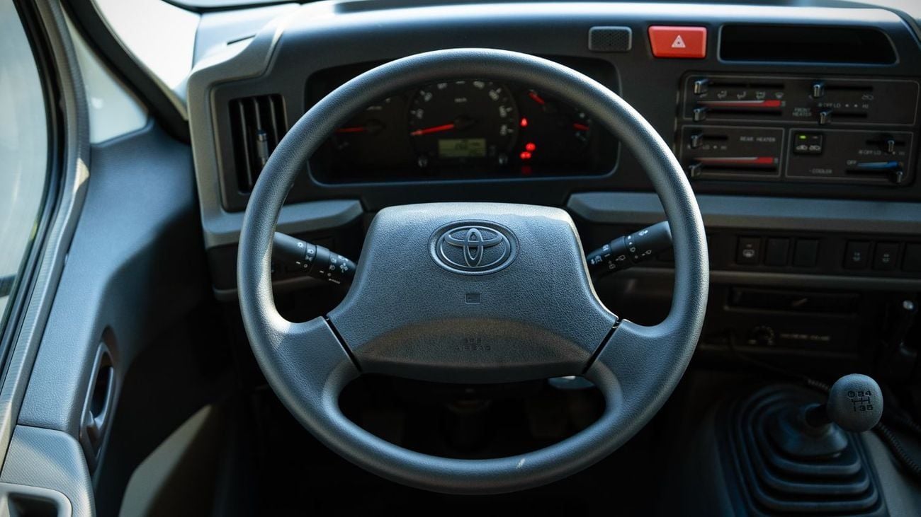 Toyota Coaster 4.0L- White Inside Grey | Export Only