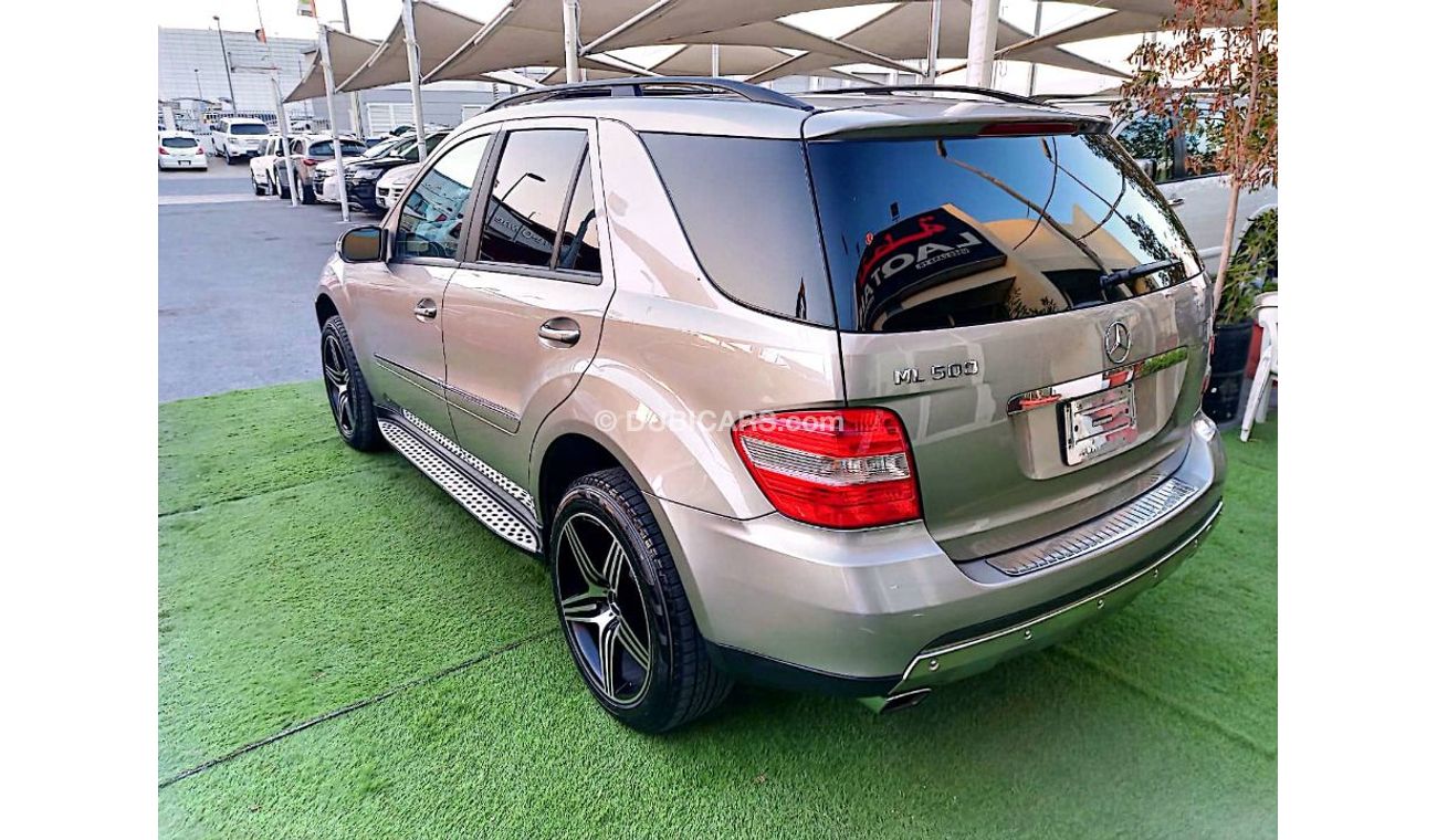 مرسيدس بنز ML 500 وارد موديل 2006 لون ذهبى رقم واحد فتحة جلد رنجات بحالة ممتازة لاتحتاج لأى مصاريف
