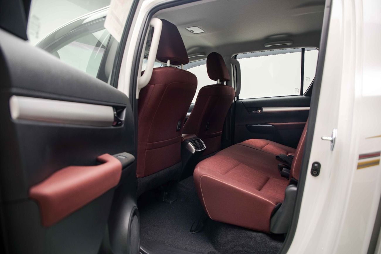Toyota Hilux 2.4L - Platinum White Inside Maroon | Export Only