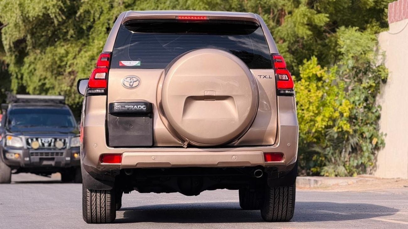 تويوتا برادو MODIFIED TO 2023 MODEL | PARKING SENSORS | BACK CAMERA | 2.7L PETROL | AUTO | LHD | REAR HEADREST LC