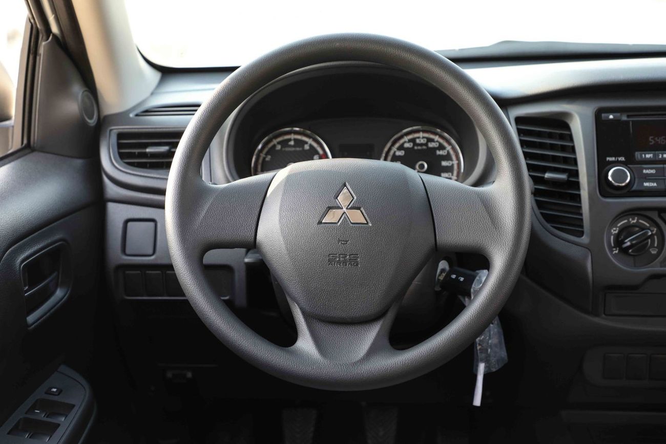 Mitsubishi L200 2023 Mitsubishi L200 DC 4x4 2.4 - White Solid inside Grey | Export Only