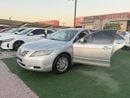Toyota Camry 4-cylinder, first owner, two original keys