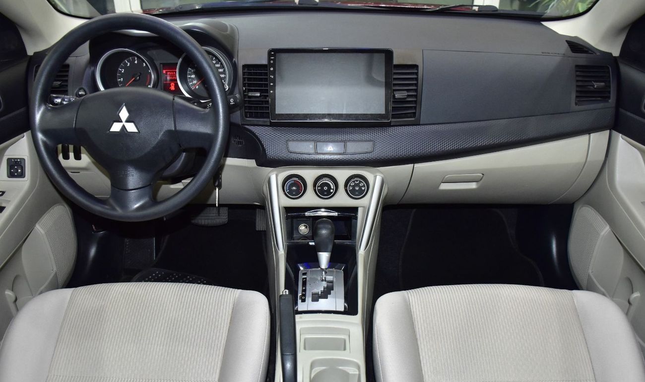 Mitsubishi Lancer EX EXCELLENT DEAL for our Mitsubishi Lancer EX ( 2016 Model ) in Red Color GCC Specs