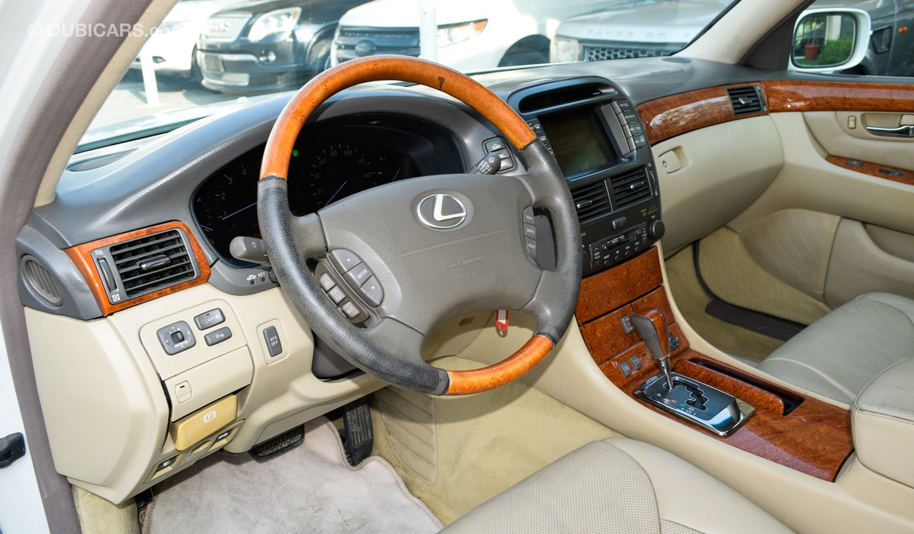 Lexus LS 430 Imported 1/2 Ultra 2006 model, white color, leather opening, wooden wheels, electric mirrors, electr