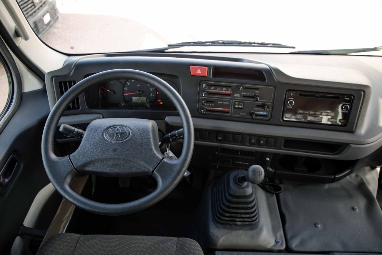 Toyota Coaster 2.7L (23-Seater) - White Inside Grey | Export Only