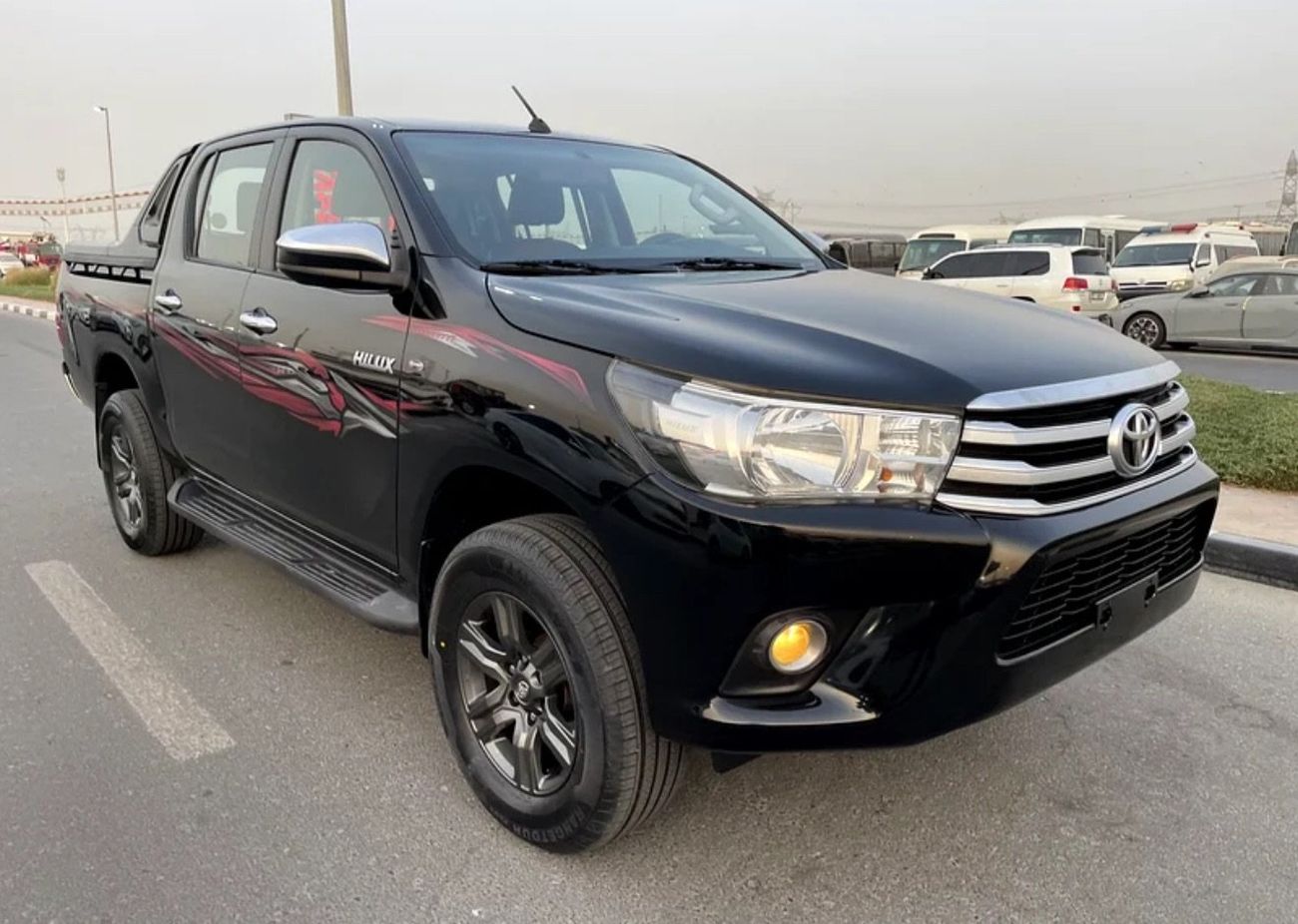 Toyota Hilux 2021 2.7 ENGINE 4 CYLINDER BLACK COLOR INSIDE BLACK AND RED GCC SPECS VERY GOOD CONDITION