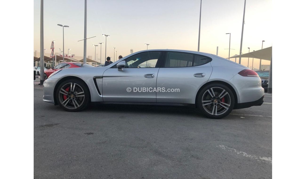 بورش باناميرا موديل 2014 خليجي فل مواصفات كراسي جلد ومثبت سرعه وتحكم كهربي كامل ونظام صوت ممتاز وكاميرا خلفيه ومثب