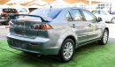 Mitsubishi Lancer Gulf gray color inside beige without accidents Rings rear wing sensors fog lights in excellent condi