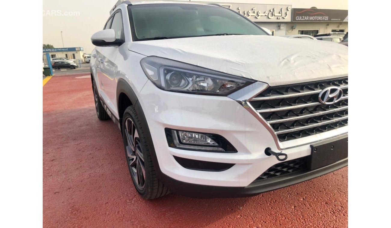 Hyundai Tucson 2.0L MODEL2021 PUSH START HAND BRACK  WIERLESS CHARGER 2 ELECTRIS SEATS FRONT & BACK SENSIOR EXPORT