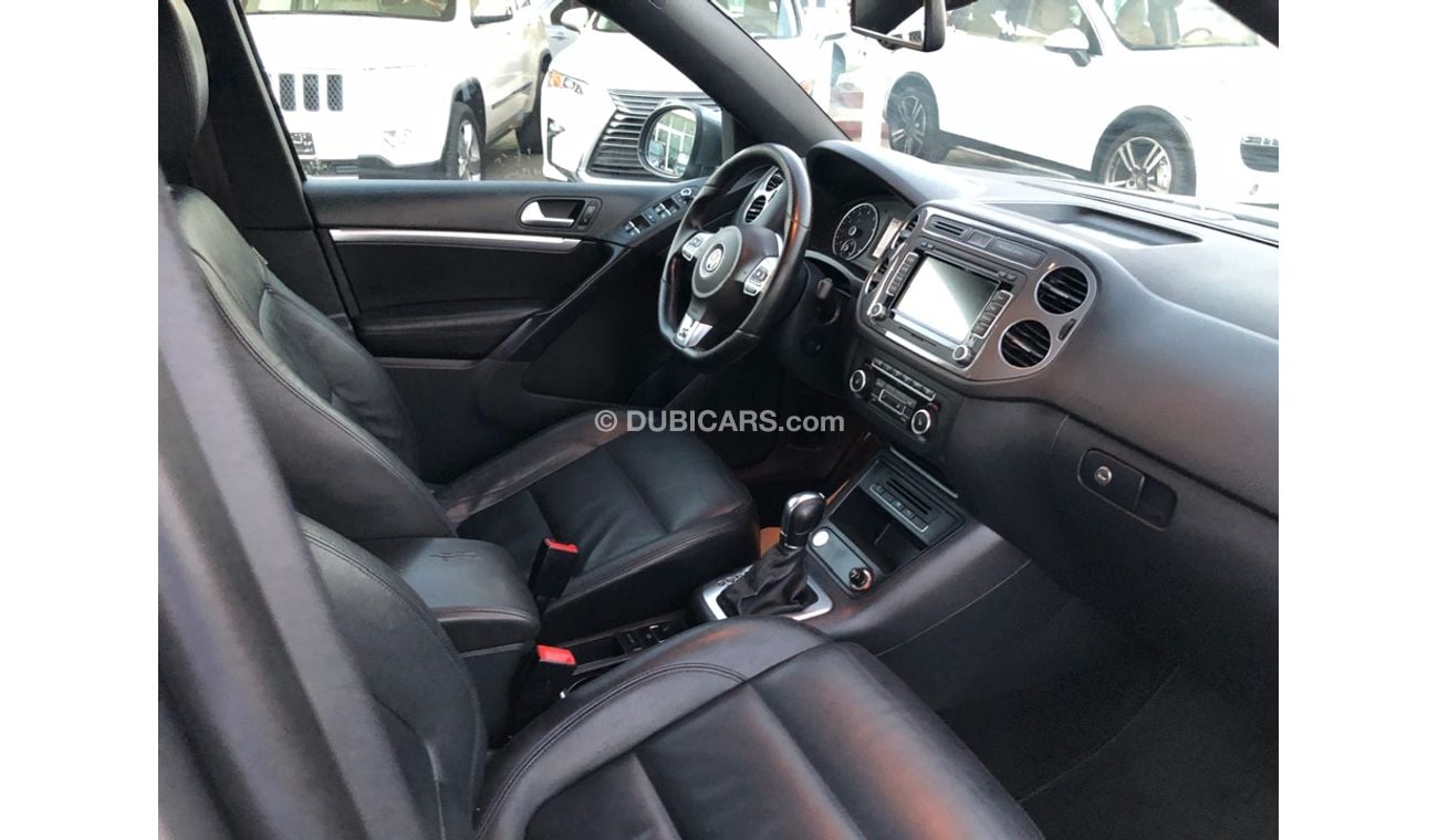 فولكس واجن تيجوان موديل 2014 خليجي فل مواصفات كراسي جلد ومثبت سرعه وتحكم كهربي كامل ونظام صوت ممتاز وكاميرا خلفيه