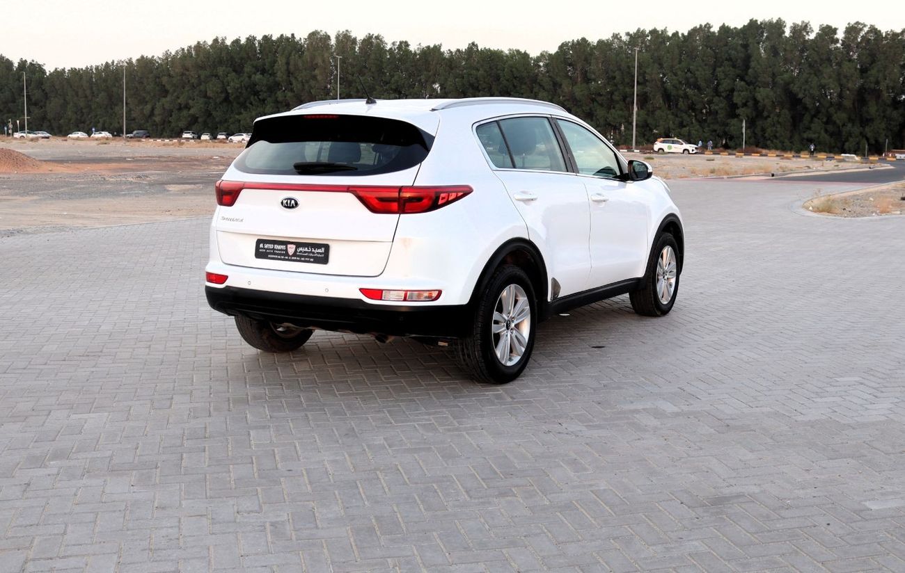 كيا سبورتيج Base خالية من الحوادث - خليجي - مكينة 2.0  - بحالة الوكالة من الداخل والخارج