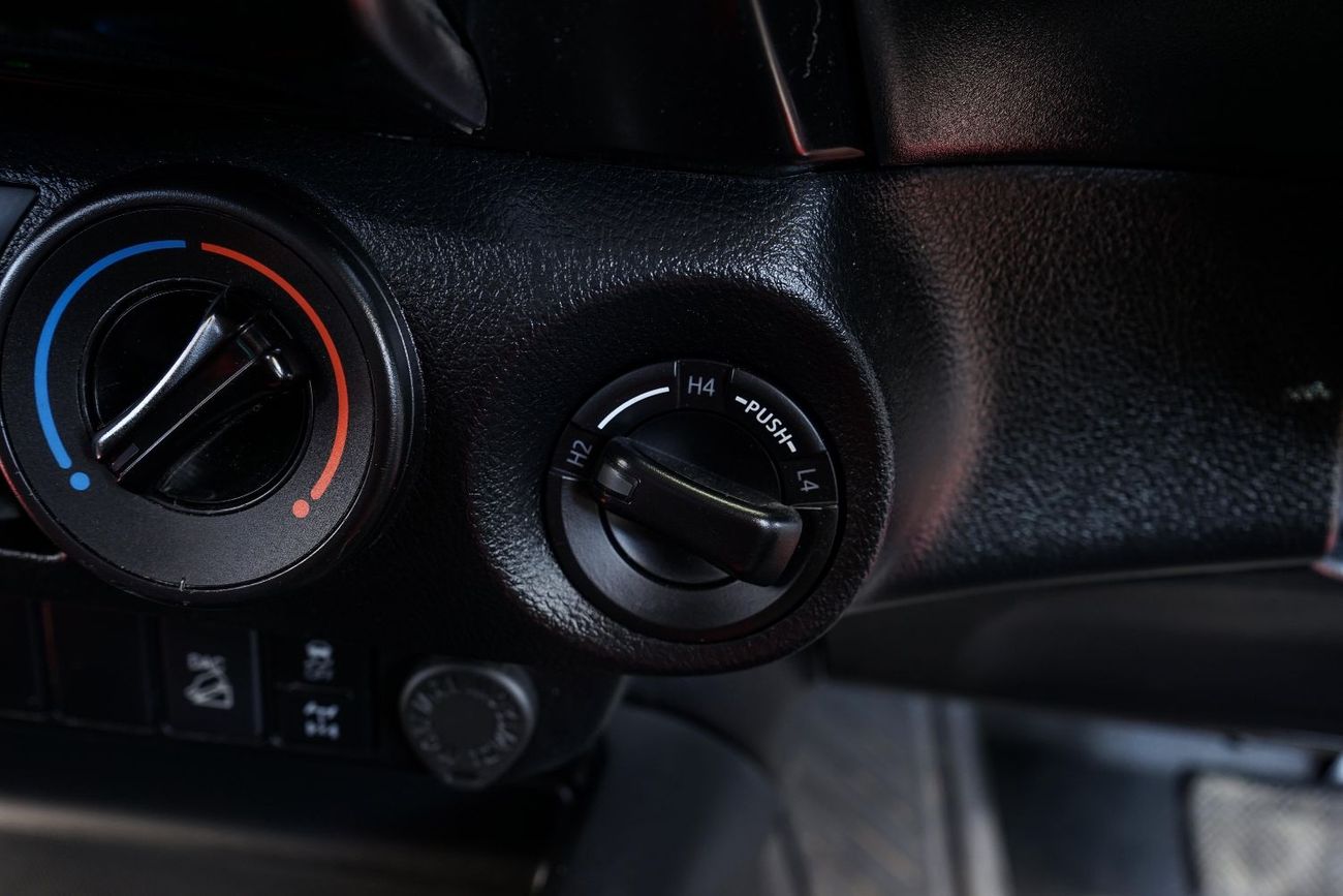 تويوتا هيلوكس The Toyota Hilux is a legendary, tough, and reliable mid-size body-on-frame pickup truck known for i