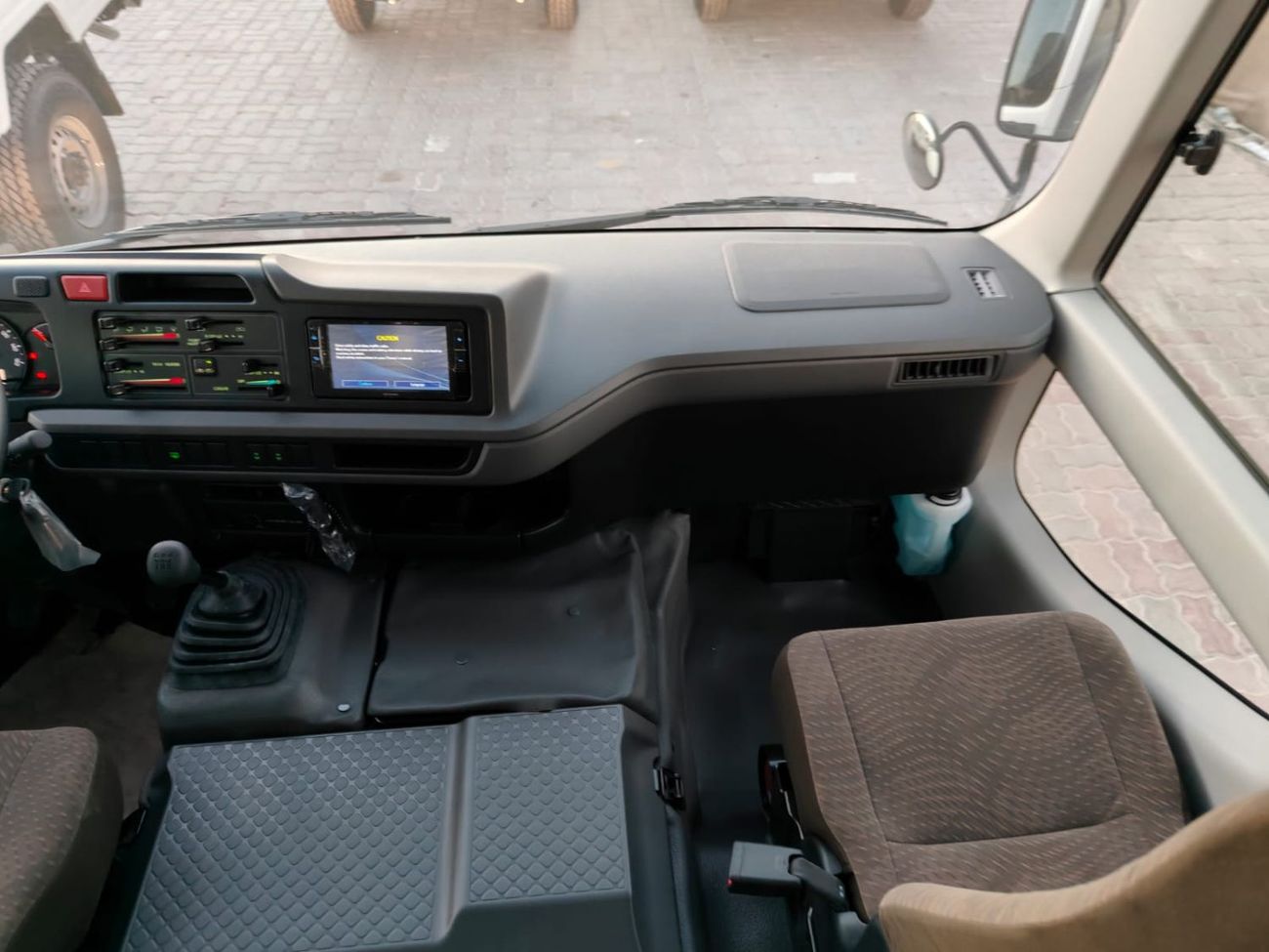 تويوتا كوستر 2025 Toyota Coaster High-Roof 23-Seater (3-Point Seatbelts) 4.0L 4-Cyl Turbo Diesel M/T RWD