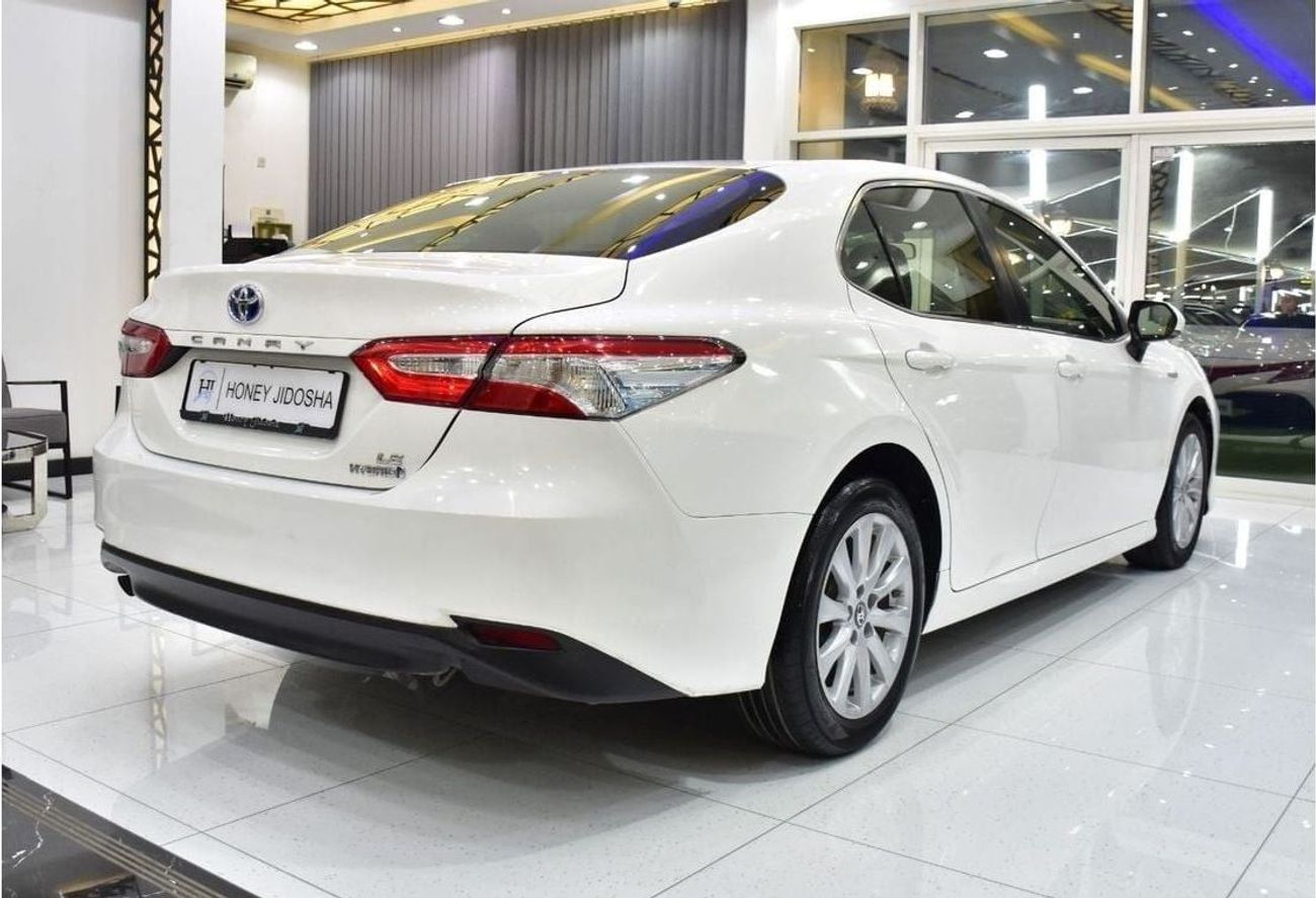 تويوتا كامري EXCELLENT DEAL for our Toyota Camry LE Hybrid ( 2019 Model ) in White Color GCC Specs