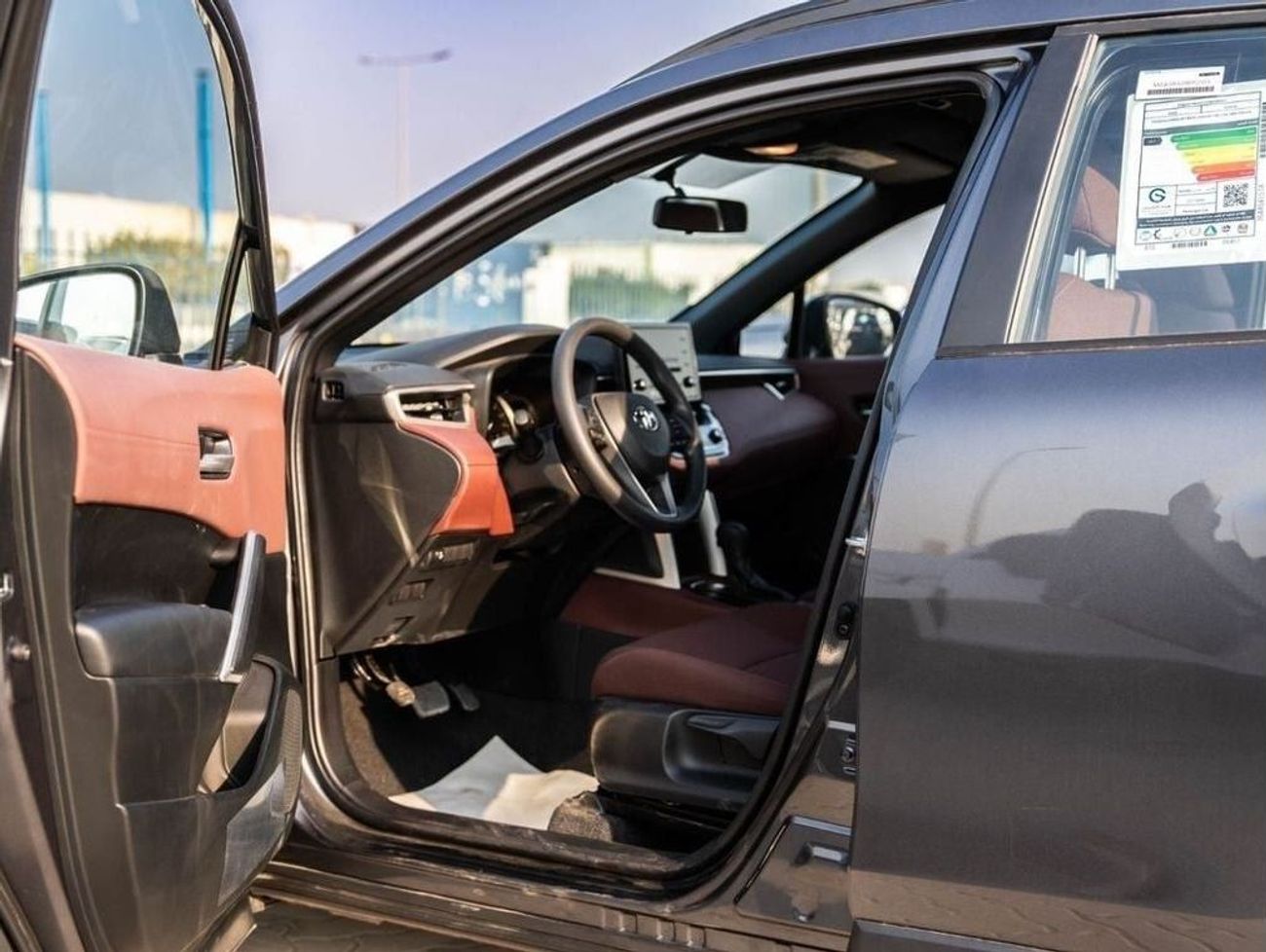 تويوتا كورولا كروس 2024 TOYOTA COROLLA CROSS 1.8 Hybrid MID - GREY METTALIC inside RED | Export Only