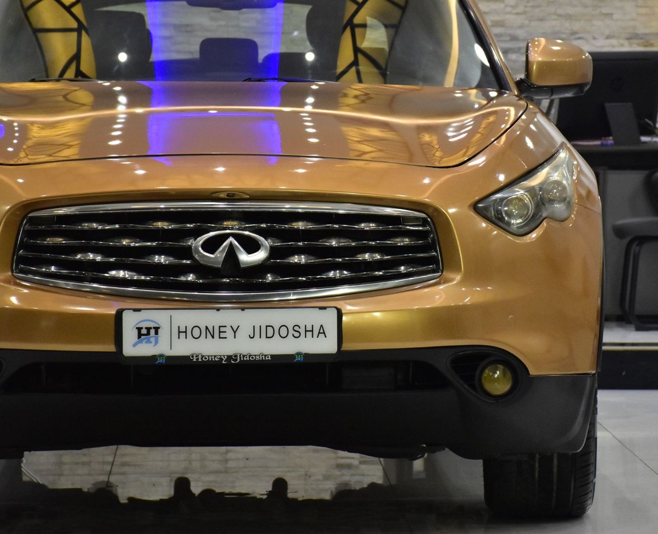 Infiniti FX50 EXCELLENT DEAL for our Infiniti FX50s ( 2009 Model ) in Orange Color GCC Specs