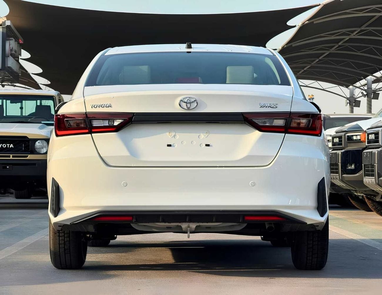 تويوتا يارس E  STANDRAD OPTION | 1.5L PETROL V4 | DVD | REAR PARKING SENSOR (CODE # YREO)