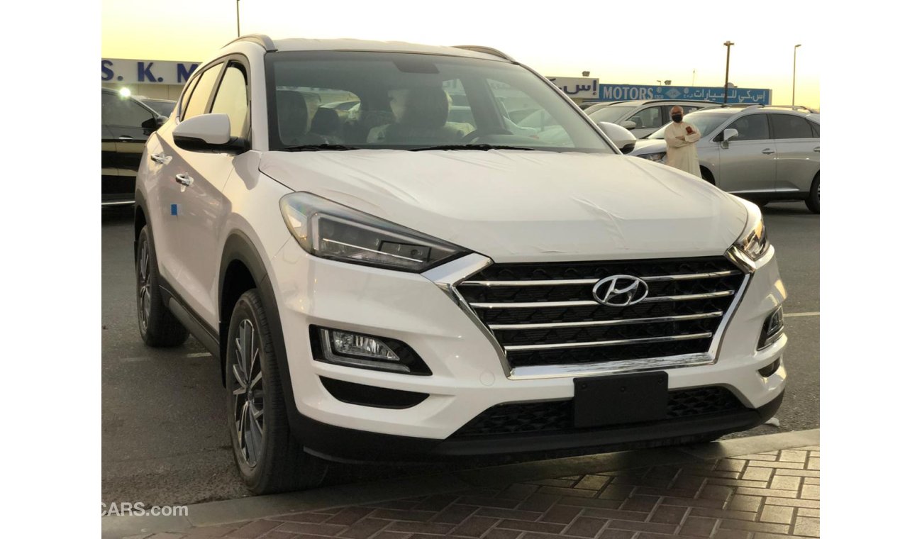 Hyundai Tucson 2.0L, Remote engine star, 18'' AW, Down Brake, Big DVD+Camera, Push Start, Wireless Charger