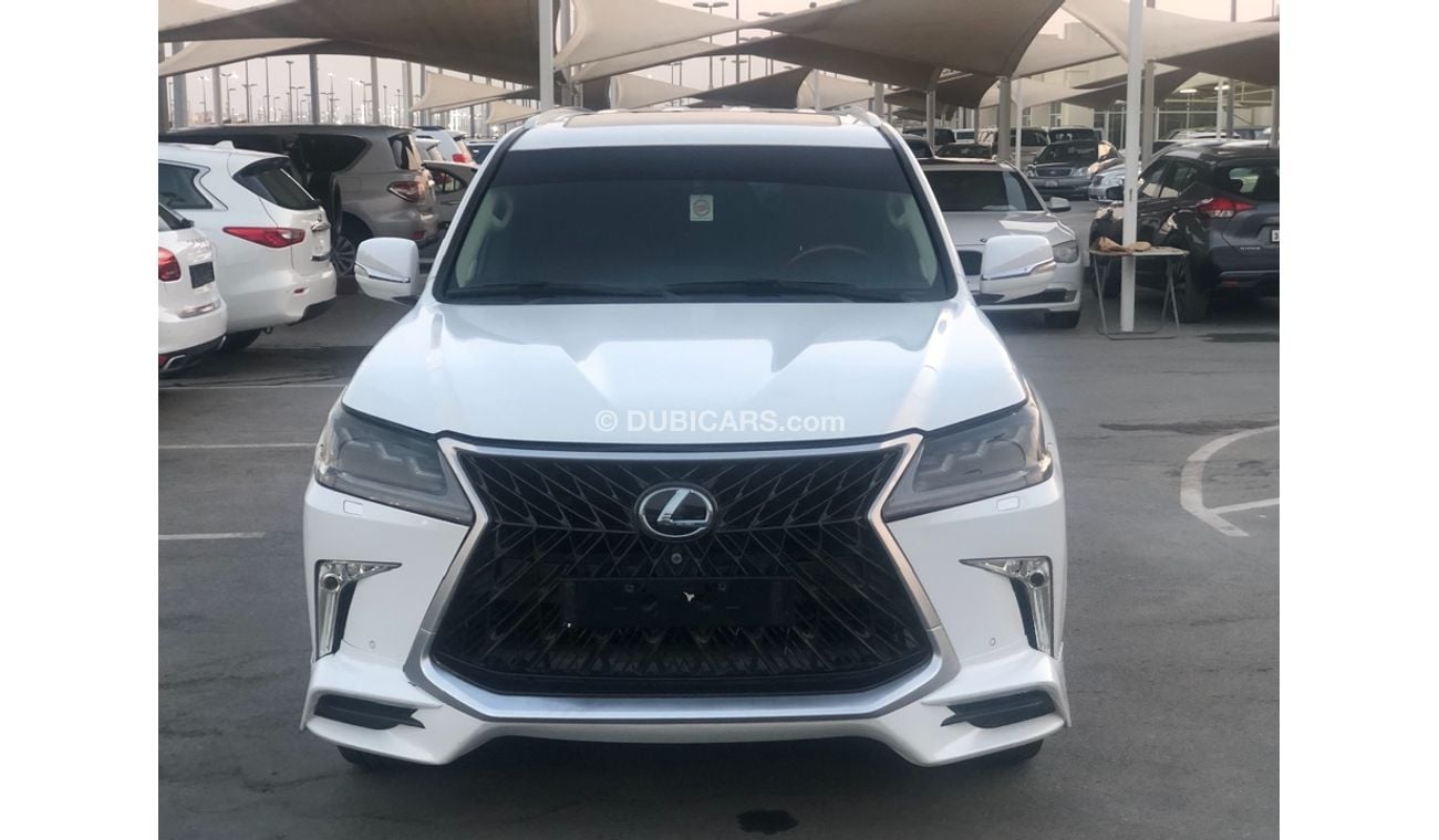 لكزس LX 570 موديل 2015 محول 2020 خليجي فل مواصفات كراسي جلد ومثبت سرعه وتحكم كهربي كامل ونظام صوت ممتاز وكاميرا