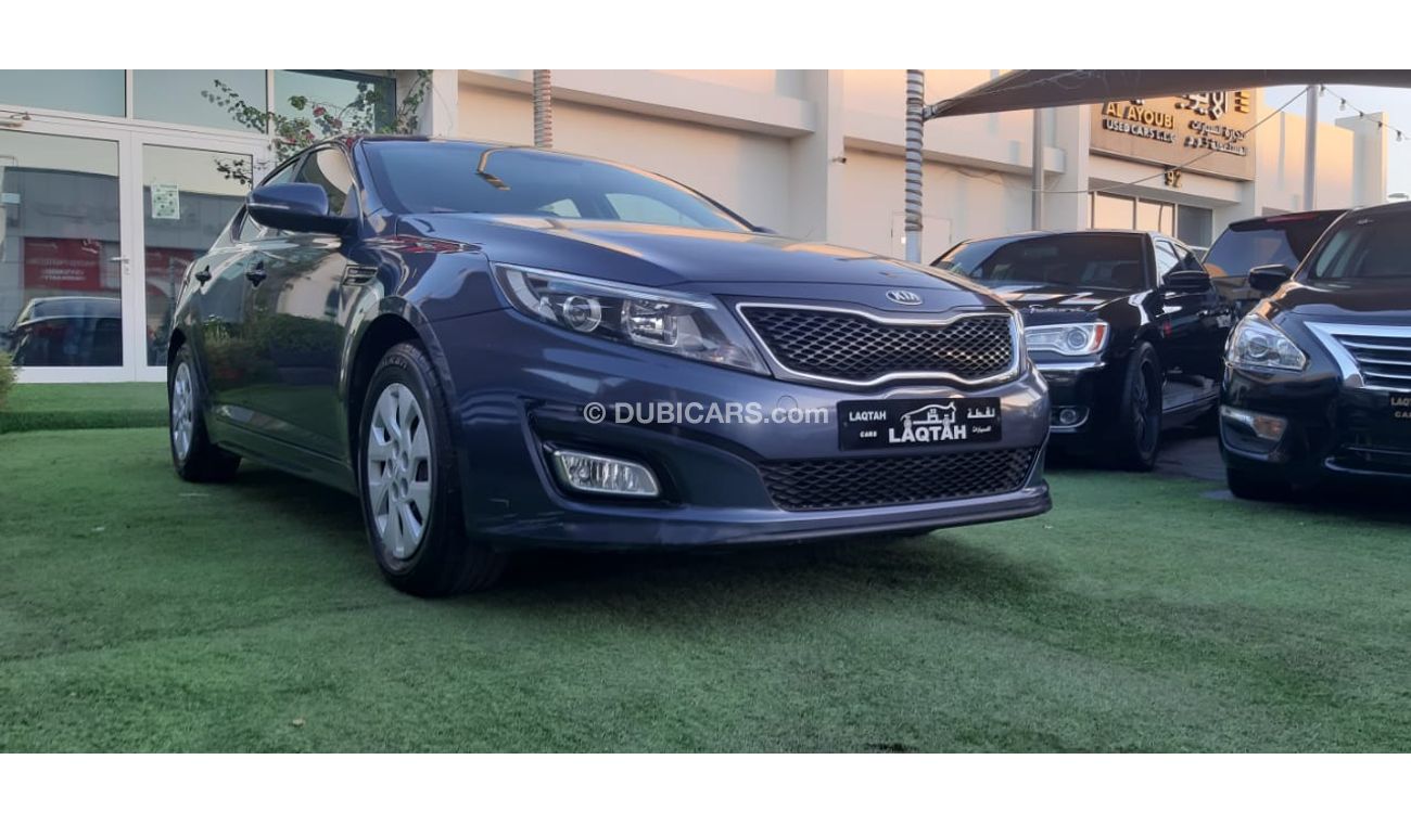 كيا أوبتيما خليجى رقم 2  شاشة   كاميرا  مثبت  سرعة  جناح خلفى رنجات حساسات أنوار ضباب بحالة ممتازة