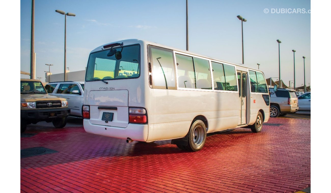 تويوتا كوستر 2014 | TOYOTA COASTER | STD ROOF | 30-SEATER GCC | MANUAL TRANSMISSION | VERY WELL-MAIN