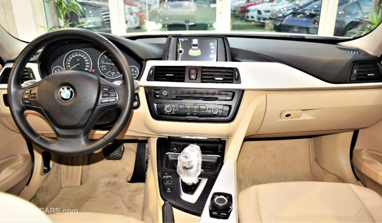 بي أم دبليو 320 Amazing BMW 320i 2013 Model!! in White Color! GCC Specs