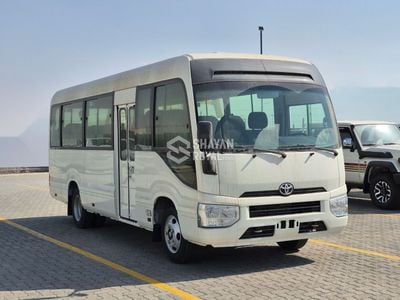تويوتا كوستر LHD 2.7L DLX PETROL 4CYL 23-SEATER MT 2025MY