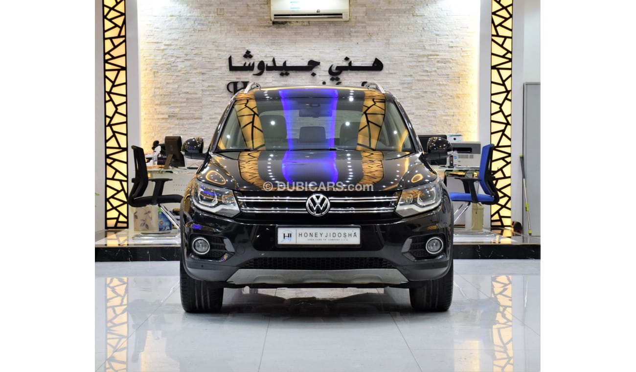 Volkswagen Tiguan SEL EXCELLENT DEAL for our Volkswagen Tiguan 2.0 TSi 4Motion ( 2014 Model! ) in Black Color! GCC Spe