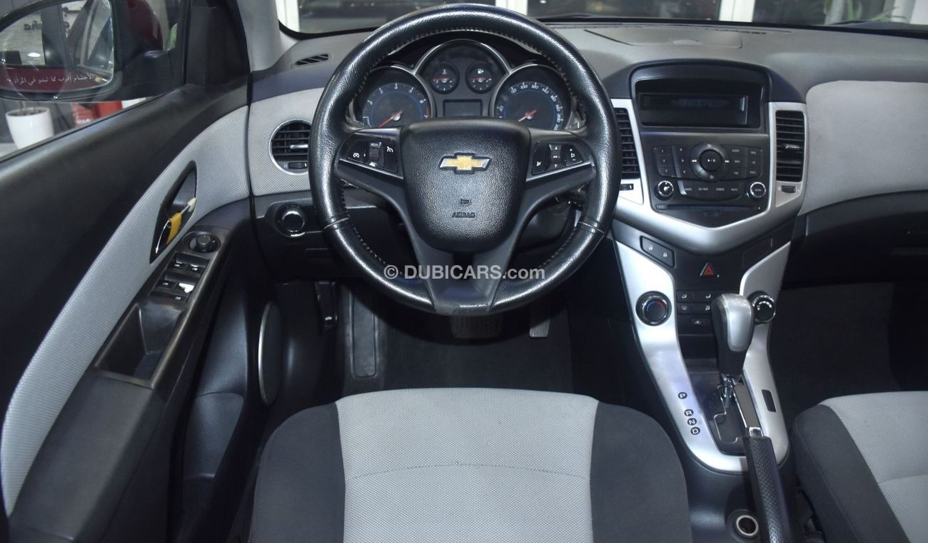 Chevrolet Cruze EXCELLENT DEAL for our Chevrolet Cruze LS ( 2012 Model ) in Red Color GCC Specs