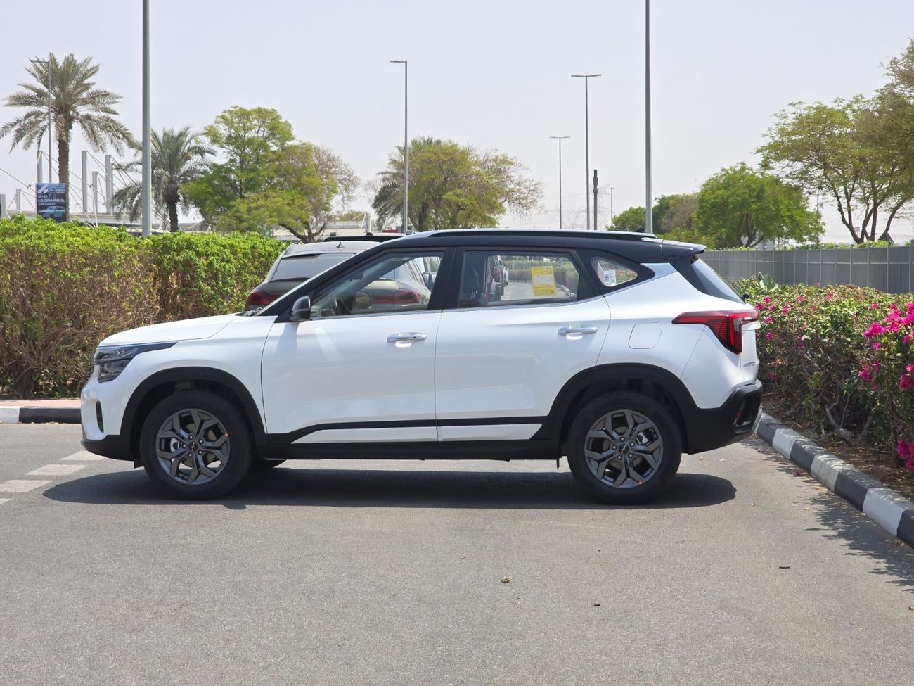 Kia Seltos available white dual tone and grey dual tone