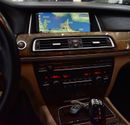 BMW 730Li INDIVIDUAL EXCELLENT DEAL for our BMW 730Li ( 2015 Model ) in White Color GCC Specs