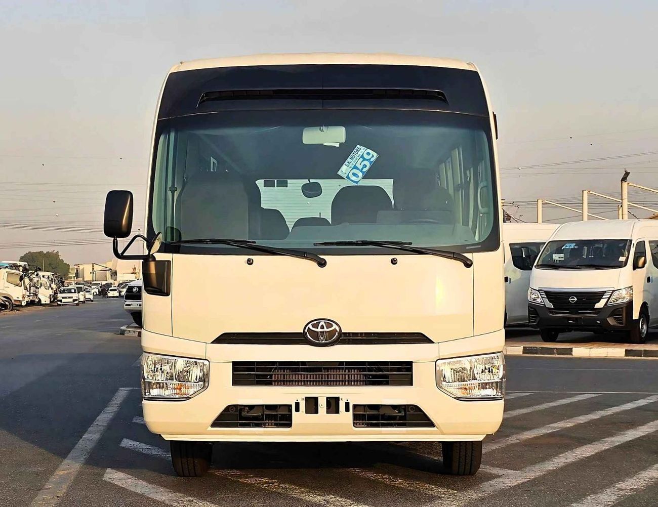 تويوتا كوستر DLX 23 SEATER/AUTO DOOR/2.7L PETROL V4 M/T/CODE#COPO