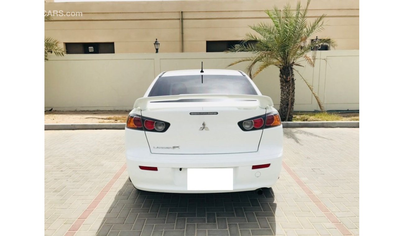 Mitsubishi Lancer 2.0 EMI 520X 60 ,0% DOWN PAYMENT , MINT CONDITION Dubai > Motors > Used Cars for Sale > Mitsubishi >