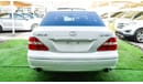 Lexus LS430 Imported 1/2 Ultra 2006 model, white color, leather opening, wooden wheels, electric mirrors, electr