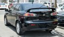 Mitsubishi Lancer ميتسوبيشي لانسر 2014حاله ممتازة بدون صبغ بدون حوادث حالة ممتازة داخل وخارج حالة الوكالة تحت الضمان