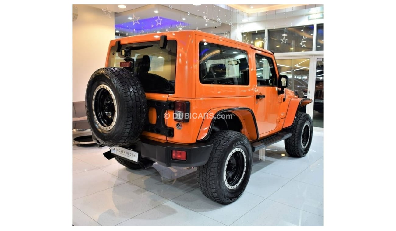 Jeep Wrangler EXCELLENT DEAL for our Jeep Wrangler SAHARA 2013 Model!! in Orange Color! GCC Specs