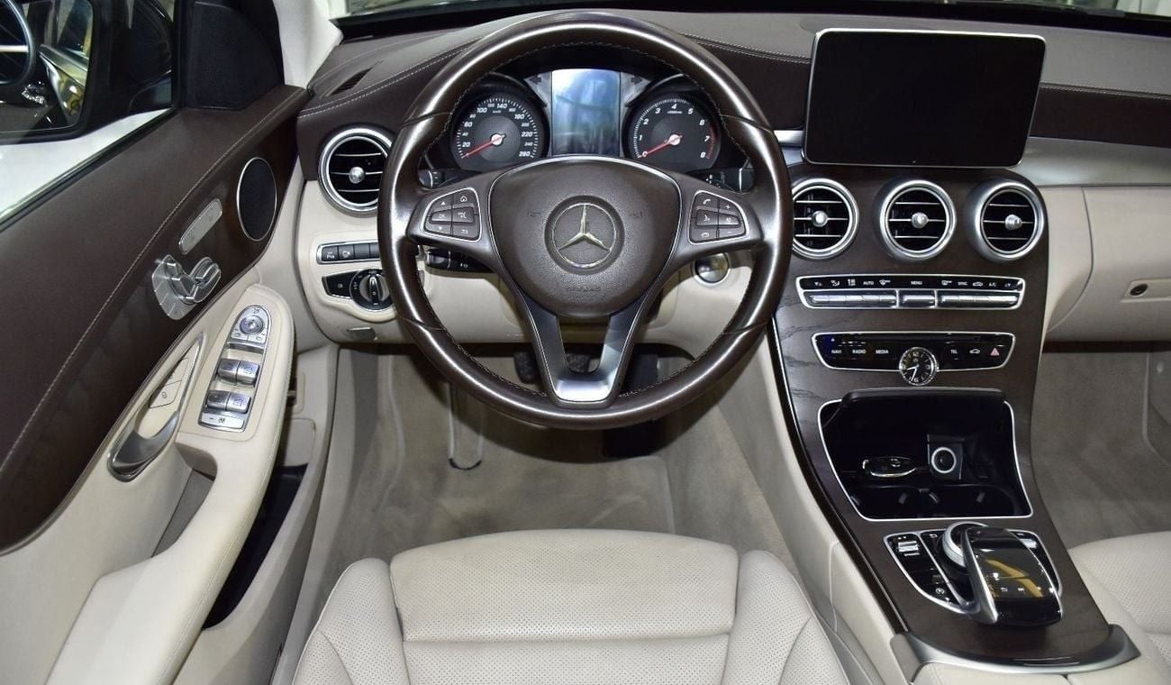 Mercedes-Benz C 200 EXCELLENT DEAL for our Mercedes Benz C200 ( 2018 Model ) in Black Color GCC Specs