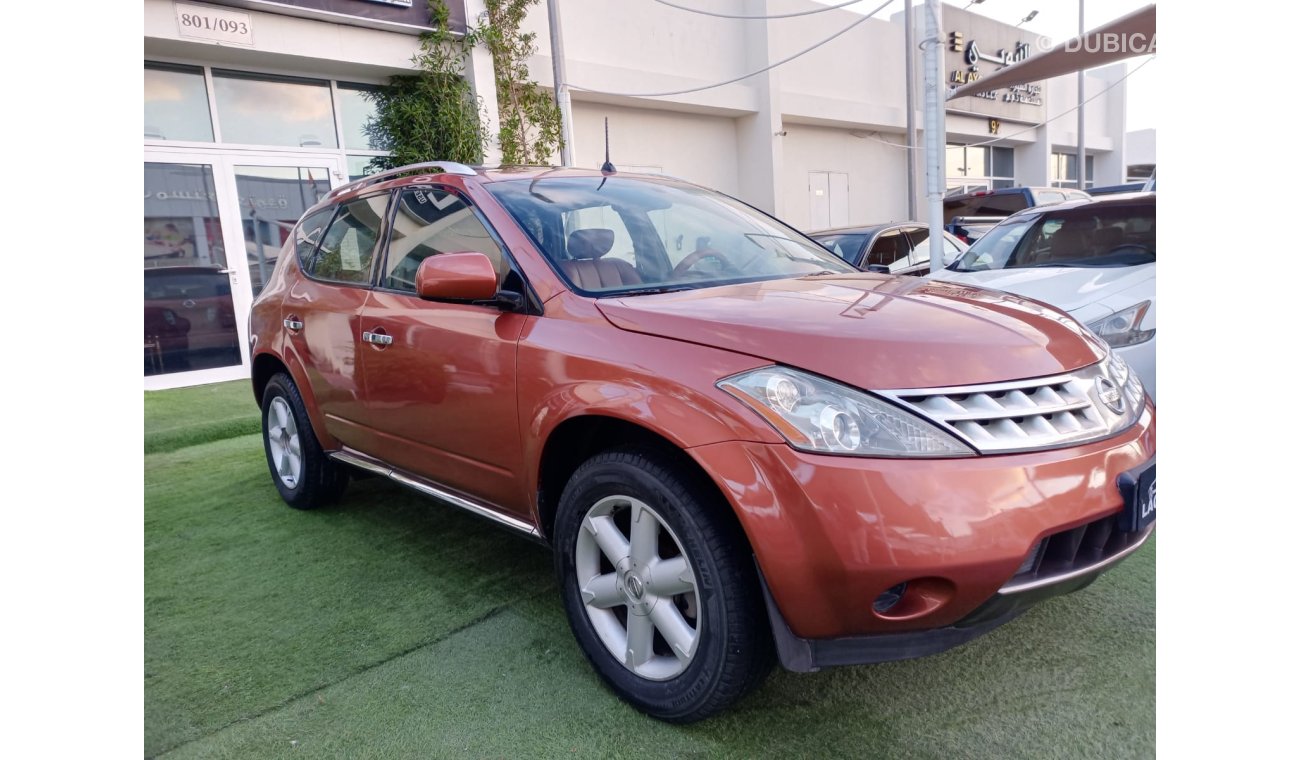 Nissan Murano Model 2008 Gulf Orange color number one Leather alloy wheels sensors in excellent condition, you do