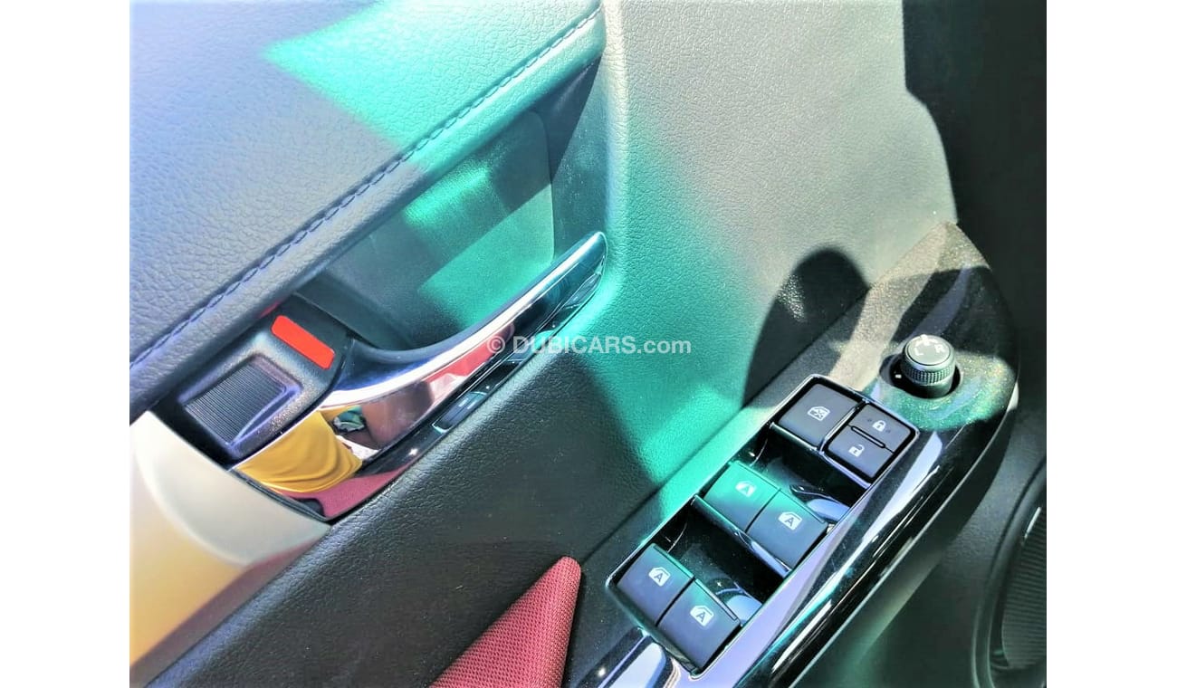 Toyota Hilux 2.7 full option with push start fridge and compr