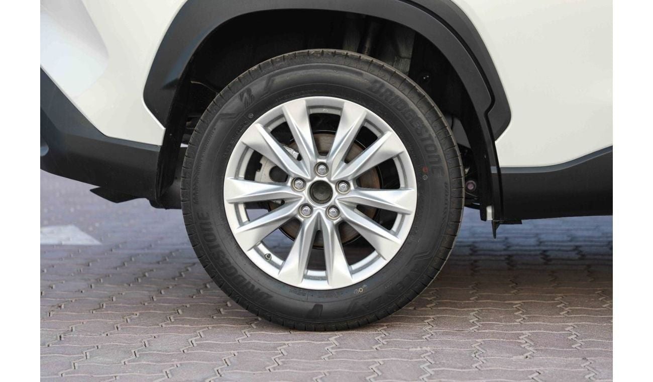 تويوتا كورولا كروس 2024 TOYOTA COROLLA CROSS 1.8 Hybrid MID - PLATINUM WHITE PEARL inside RED | Export Only