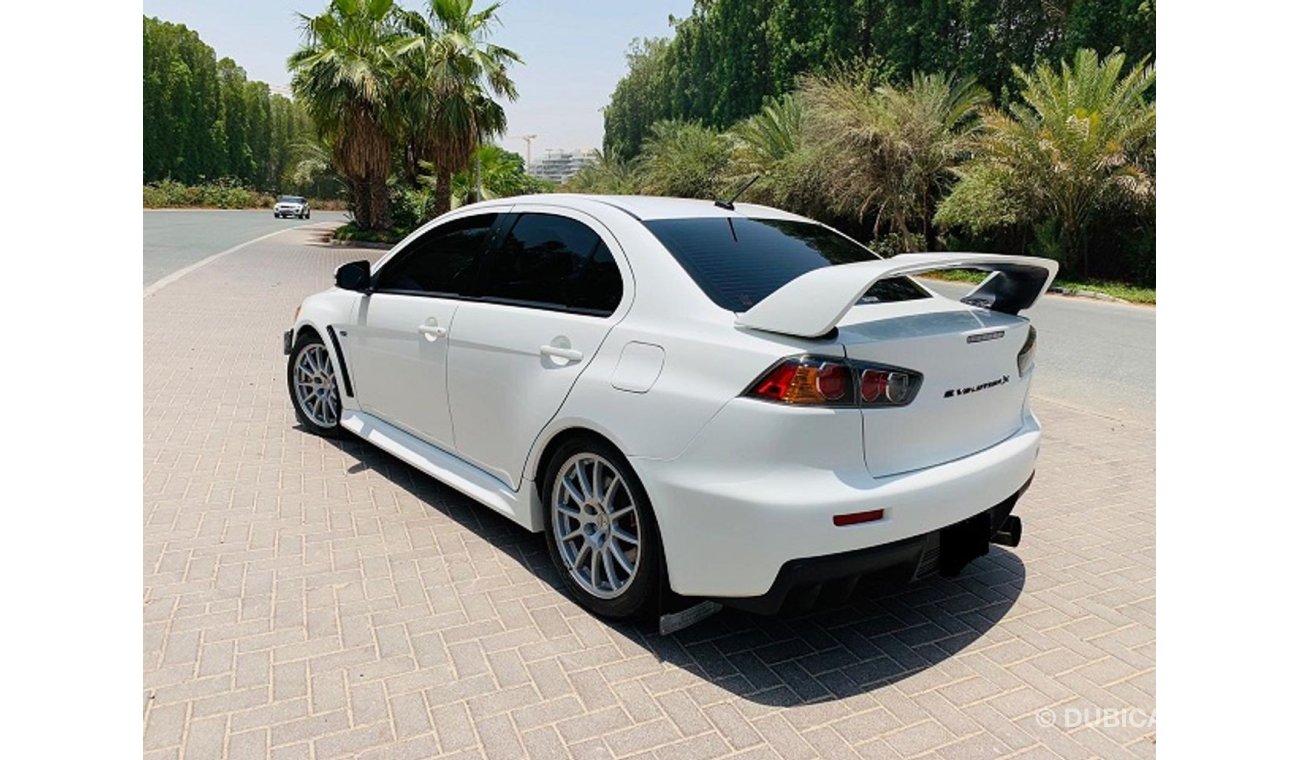 Mitsubishi Evo 2015 Mitsubishi Lancer Evolution X White | A 1001