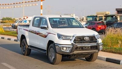 تويوتا هيلوكس Toyota Hilux pickup double cabin Petro engine 2.7L 4x4 white with red interior fully automatic
