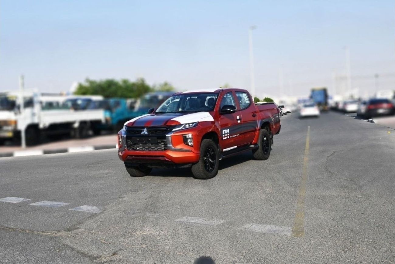 ميتسوبيشي L200 ميتسوبيشي L200 ديزل فل أوبتيون أوتوماتيك 2.4 لتر برتقالي من الخارج أسود من الداخل