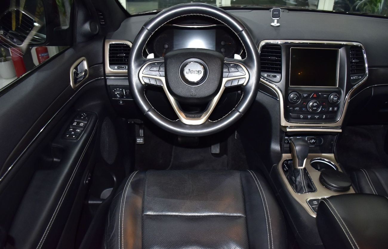 Jeep Grand Cherokee EXCELLENT DEAL for our Jeep Grand Cherokee Limited 4x4 ( 2016 Model ) in Red Color GCC Specs