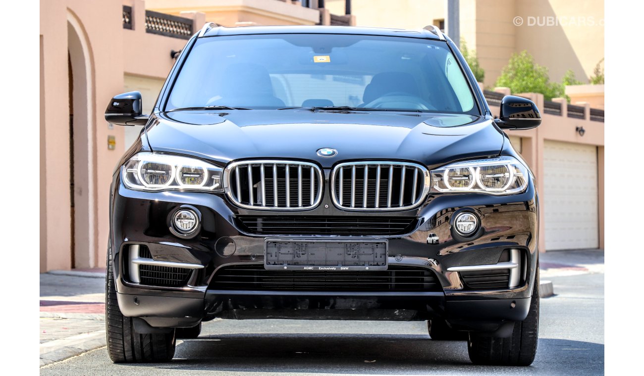 BMW X5 X-Drive 50i 2014 GCC under Warranty with Zero Down-Payment.