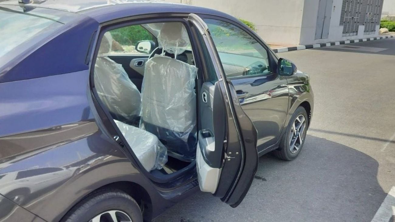 Hyundai Grand i10 1.2L Petrol Engine Sedan | Gray and Silver | 2024