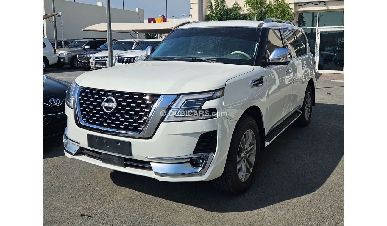 Nissan Patrol SE Platinum 2013 change 2021