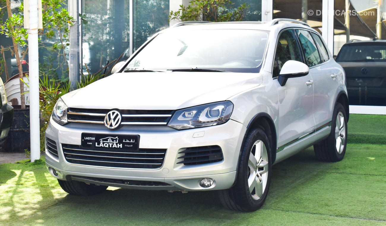 Volkswagen Touareg Gulf 2013 model, paint, agency, panorama, leather, cruise control, alloy wheels, sensors, in excelle