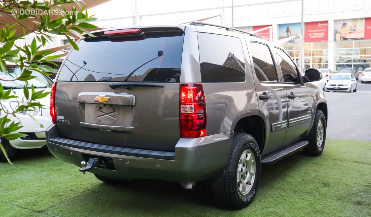 Chevrolet Tahoe Gulf model 2012, gray inside, beige, cruise control, wheels, sensors, screen, camera, in excellent c