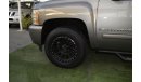 Chevrolet Silverado Pickup model 2009 imported silver color, equipped with two side halves, tyote wheels, sensors cruise